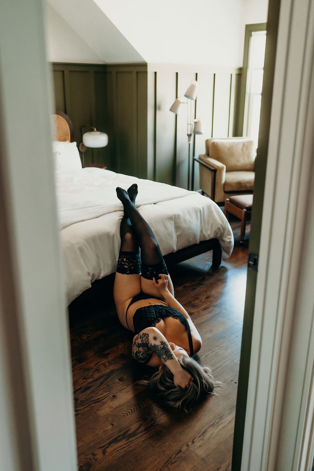 boudoir photography with girl laying seductively on the floor